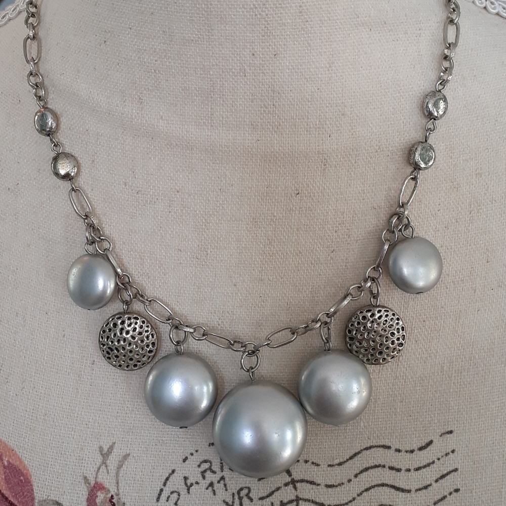 # Orbs of mysterious joy Statement Necklace